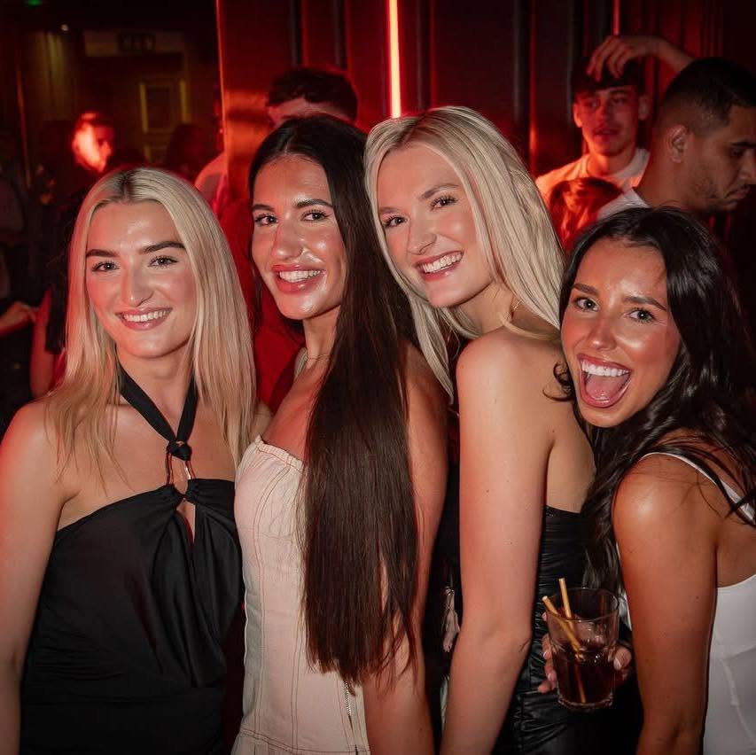 Friends dressed up for a night in the club
