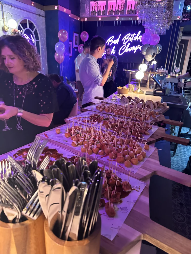 A buffet spread laid out for a private party in Le Fleur